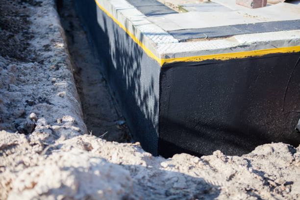Professional Exterior Waterproofing technician working in Rensselaer, NY